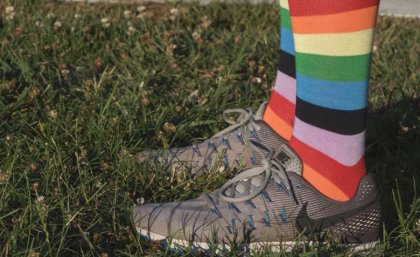 Rainbow socks in running shoes